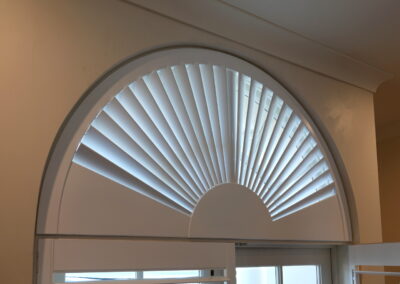 Fan style Shutter blind in an arched window - adjustable louvres
