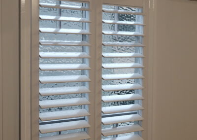 Plantation Shutter with Fy Screens - Queensander