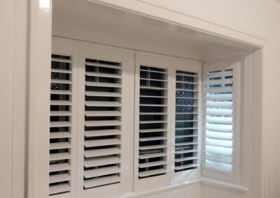 Plantation shutters in Bay Window - with fly screens